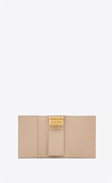 Cassandre slim key case in grain de poudre embossed leather